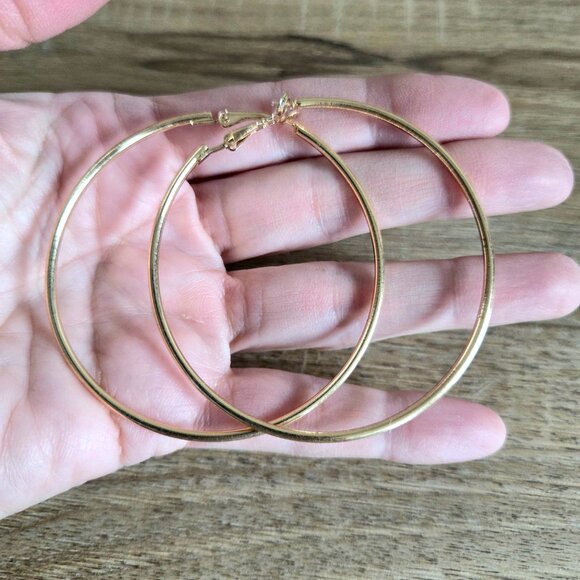 Large gold tone metal loops earrings. - Picture 3 of 3